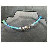 Jewelry Collection with Beaded Necklaces, Bracelets, and Gold-Tone Crocodile Pin