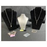 Sterling Silver Jewelry Collection with Necklaces, Bracelets, and Dark Gray Stone Ring