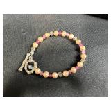 Sterling Silver Jewelry Collection with Necklaces, Bracelets, and Dark Gray Stone Ring