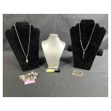 Sterling Silver Jewelry Collection with Necklaces, Bracelets, and Dark Gray Stone Ring
