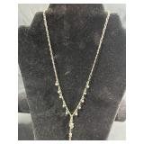 Sterling Silver Jewelry Collection with Necklaces, Bracelets, and Dark Gray Stone Ring