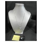 Sterling Silver Jewelry Collection with Necklaces, Bracelets, and Dark Gray Stone Ring