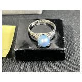 Sterling Silver Jewelry Collection with Necklaces, Bracelets, and Dark Gray Stone Ring