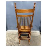 Antique Oak Wood Glider Rocking Chair with Ornate Cushion