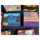 Collection of Jigsaw Puzzles Assorted Themes and Piece Counts