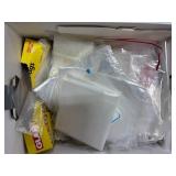 Collection of Plastic Bags and Round Paper Tags with String