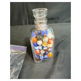 Collection of Vintage Marbles in Glass Bottle and Bag with 2 Pez Dispensers