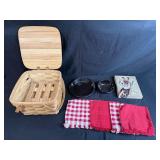 Picnic Basket Set with Black Speckled Dishes, Red Napkins, and Giraffe Art