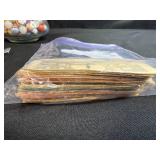 Vintage Marbles in Glass Vase with Monopoly Game Money and Cards