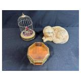 Vintage Decorative Collection: Cat Figurine, Birdcage Display, and Ornate Glass Jewelry Box