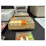 Collection of Country Music Cassette Tapes with Motorola Cassette Recorder and Storage Bins