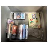 Collection of Country Music Cassette Tapes with Motorola Cassette Recorder and Storage Bins