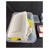 Mixed Lot of Vintage License Plates, Stone Carvings, and Miscellaneous Items in Storage Bins