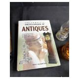 Antique Lot with Oil Lamps, Textiles, Suitcase, and Encyclopedia