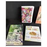 Collection of Cookbooks and Bartender Guides with Storage Bin