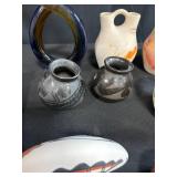 Collection of Southwestern Style Pottery, Art Glass Sculpture, and Fabric Textiles