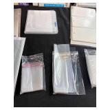 Assorted Photo Album, Business Card File, and Sheet Protector Collection