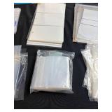 Assorted Photo Album, Business Card File, and Sheet Protector Collection