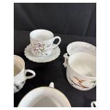 Collection of Antique and Vintage Porcelain Cups and Saucers with Handpainted Details