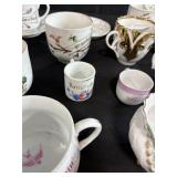 Collection of Antique and Vintage Porcelain Cups and Saucers with Handpainted Details