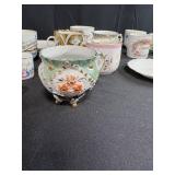 Collection of Antique and Vintage Porcelain Cups and Saucers with Handpainted Details