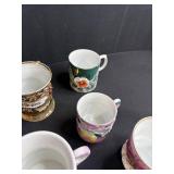 Collection of Antique and Vintage Porcelain Cups and Saucers with Handpainted Details