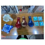 Set of Art Glass Items Including Coasters, Spoon Rests, and Ruffled Bowls