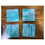 Set of Art Glass Items Including Coasters, Spoon Rests, and Ruffled Bowls