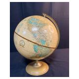 Collection with Vintage Globe, Signed Glass Sculpture, and Ship Bookend