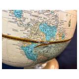 Collection with Vintage Globe, Signed Glass Sculpture, and Ship Bookend