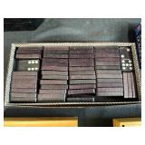 Assorted Board Game Pieces, Dominoes Sets, Poker Chips, and Storage Bin