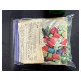 Assorted Board Game Pieces, Dominoes Sets, Poker Chips, and Storage Bin