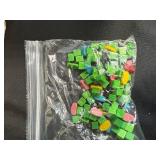 Assorted Board Game Pieces, Dominoes Sets, Poker Chips, and Storage Bin