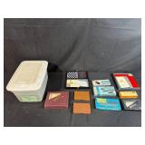 Collection of Dominoes, Checkers, and Classic Board Game Sets in Storage Box
