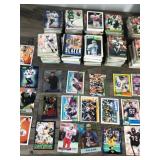 Lot of Football Cards and One Starting Lineup Figurine (Russell Maryland)