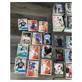 Lot of Football Cards and One Starting Lineup Figurine (Russell Maryland)