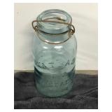 Lot of Collectible Marbles in a Vintage Atlas Jar