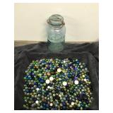 Lot of Collectible Marbles in a Vintage Atlas Jar