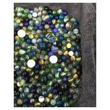 Lot of Collectible Marbles in a Vintage Atlas Jar