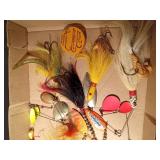 Box of spinners, lures and a tin of hooks