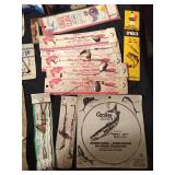 Box of vintage spinners and hooks on original cards and more