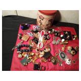 Tin of vintage jewelry and more