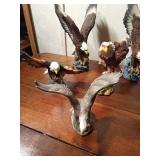 Ceramic and resin eagle figurines and 1 toucan