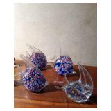 Wood, glass, ceramic and sand fish figurines