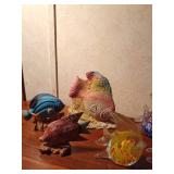 Wood, glass, ceramic and sand fish figurines