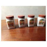 4 Vintage glass spice jars with metal lids