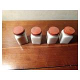 4 Vintage glass spice jars with metal lids