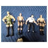 Wrestling figurines including Hulk Hogan