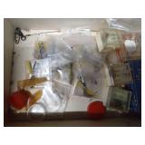 Cigar box of fishing items