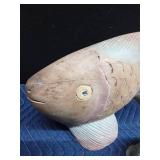 Large wood and a ceramic fish